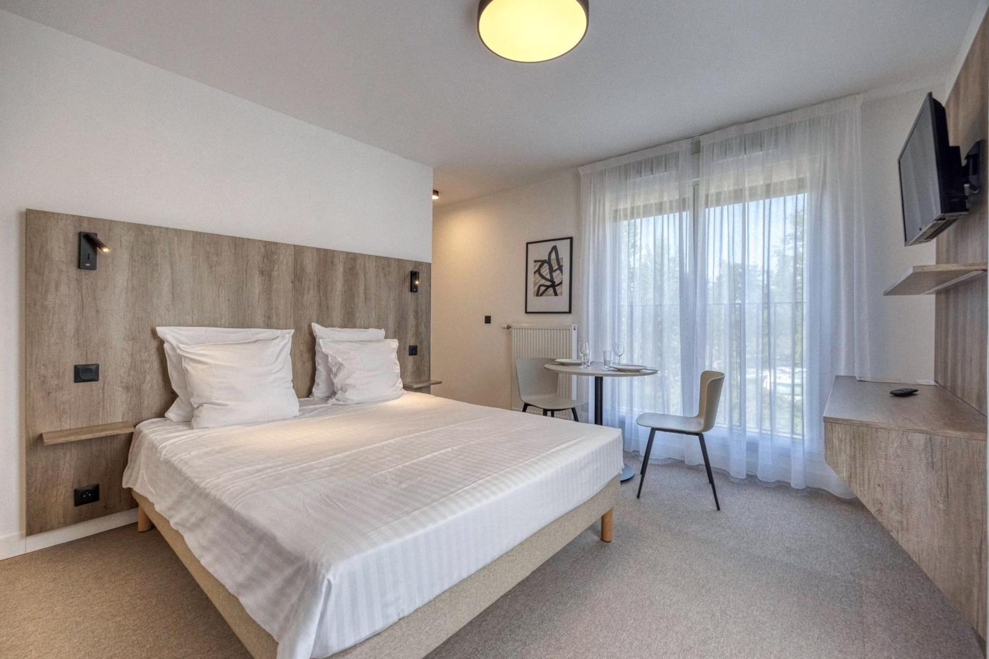 Kosy Appart'Hotels - Residence Du Lac อิกซ์เลส์แบ็งส์ ภายนอก รูปภาพ